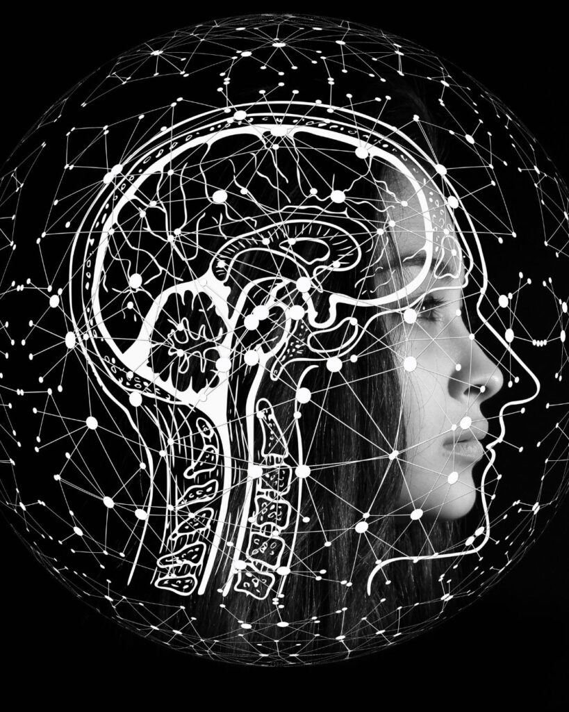 A side view of the outline of woman's brain over her head and face - depicting the neural pathways of the brain and the impact on them caused by betrayal trauma